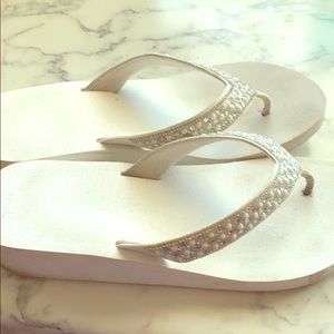 Woman’s White Sandals with glitter.